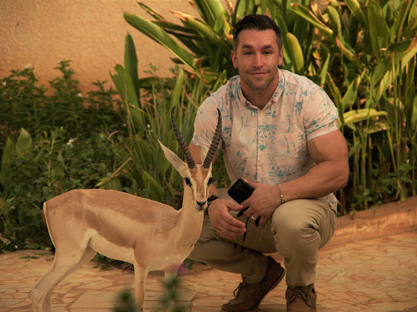 Johan Mackie with Leif the Gazelle in Niamey, Niger